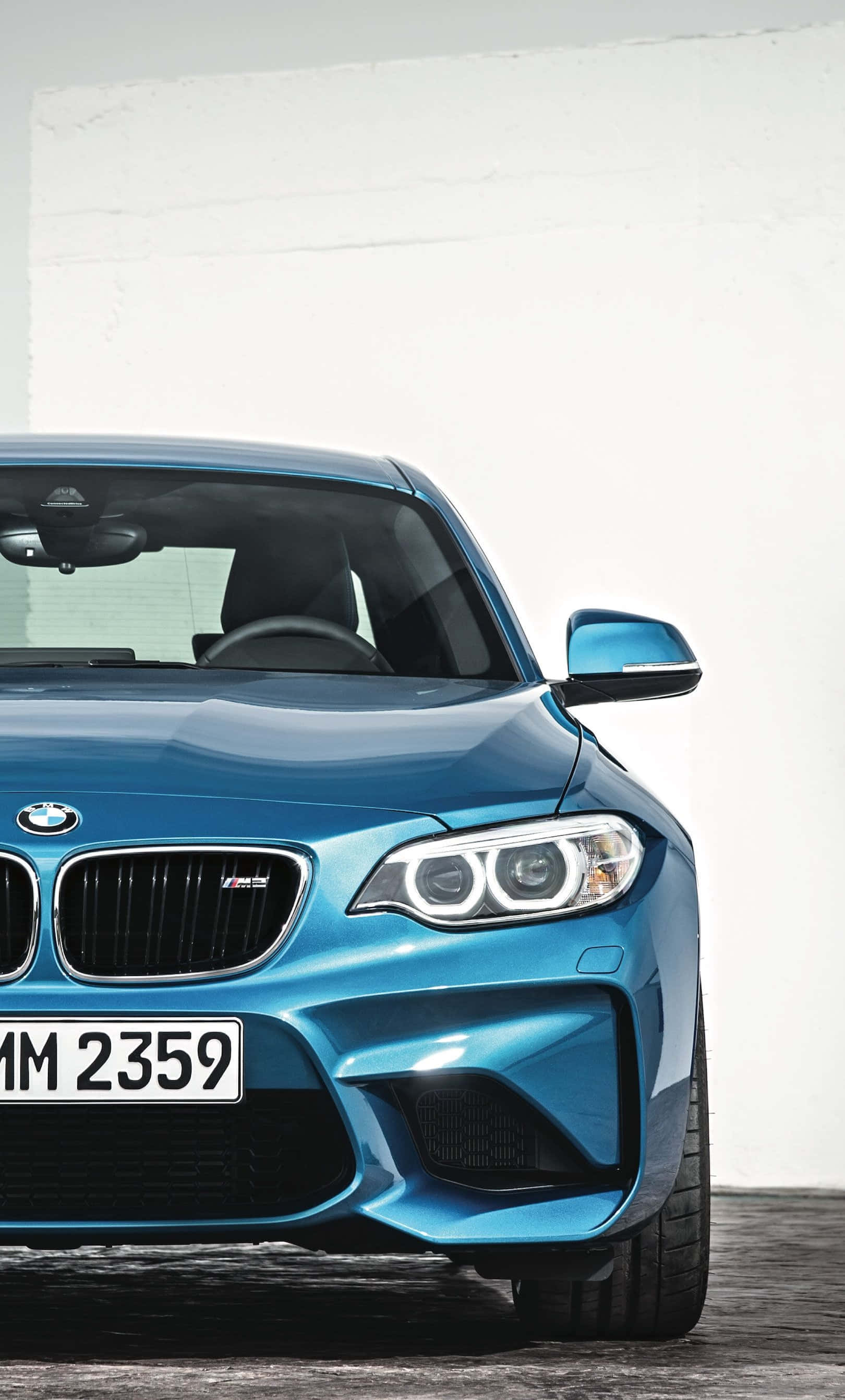 スタイリッシュなBMW iPhone壁紙：エレガントなスポーツカーとロゴ 壁紙