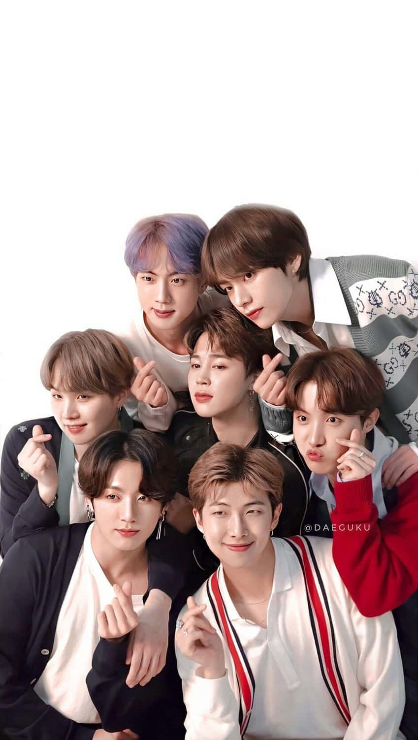 BTSの可愛いメンバーが指ハートをしている笑顔の写真 壁紙