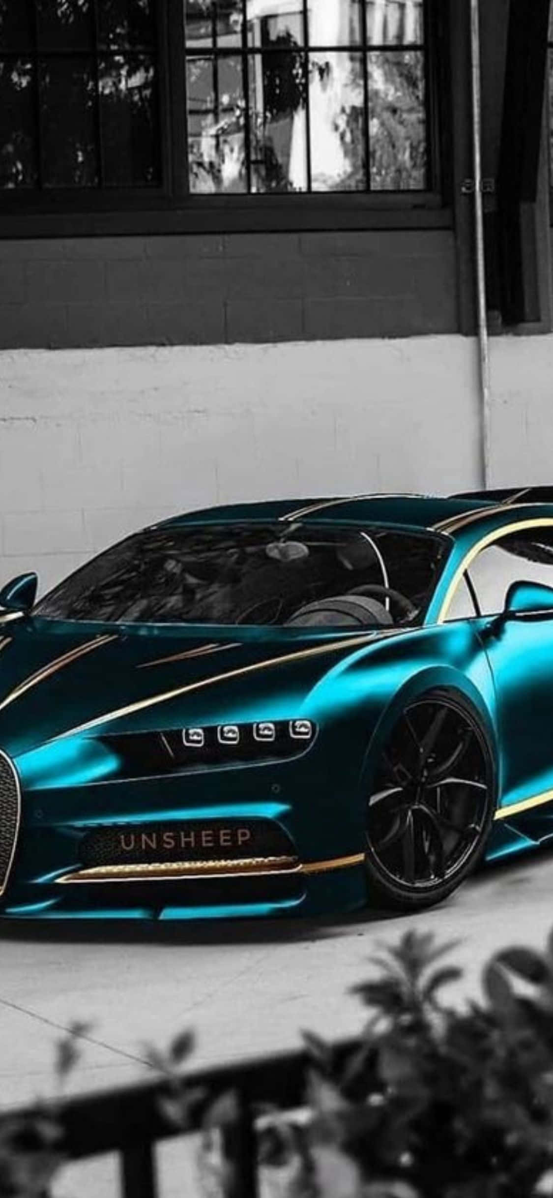 贅沢なBugattiとモダンなiPhone Xsの組み合わせ 壁紙