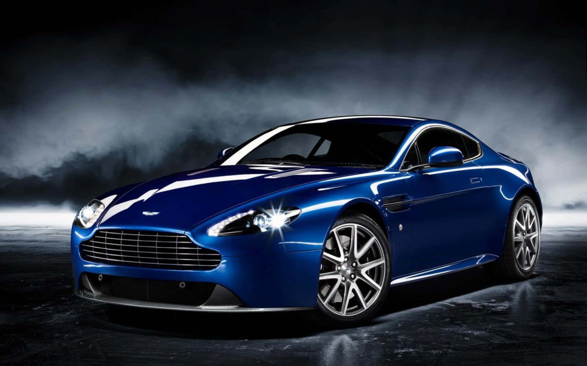 風光明媚なルートを走る見事なアストンマーティン DB9 壁紙
