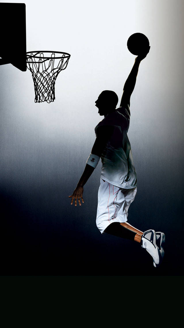 シルエットで描かれたダンクシュートを決める男性のスポーツiPhone 壁紙
