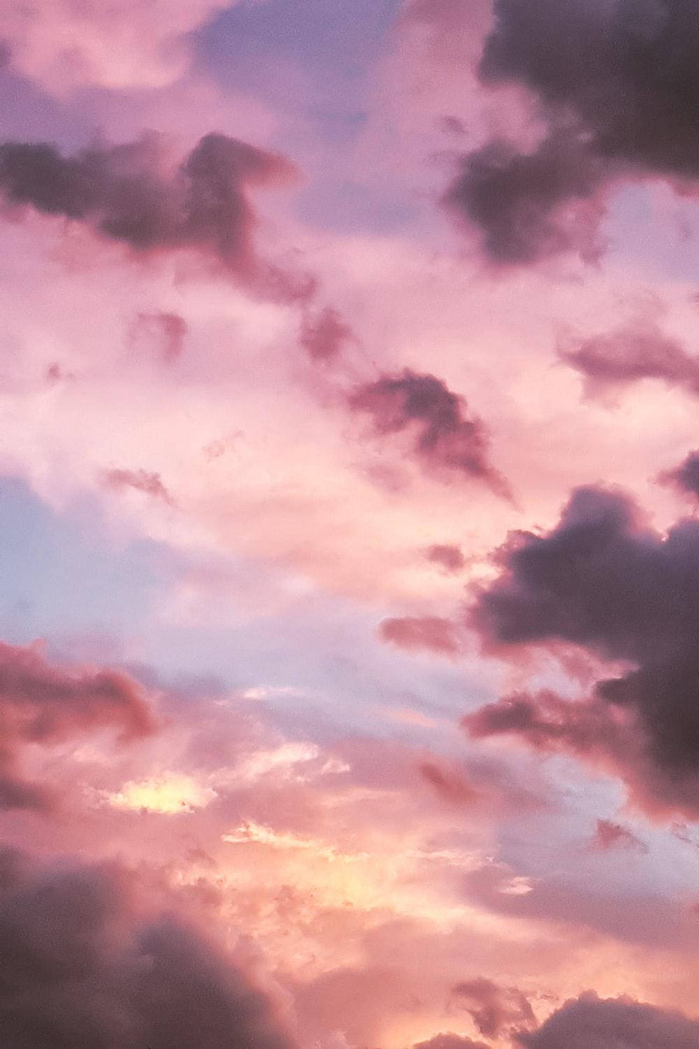 iPhoneピンクの美的夕日 壁紙
