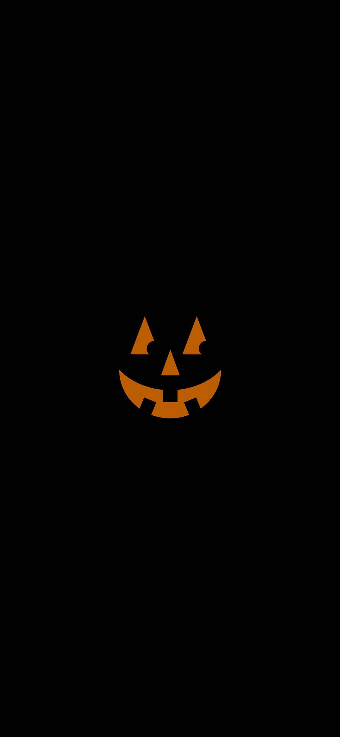 不気味に笑うカボチャのハロウィンiPhone壁紙 壁紙