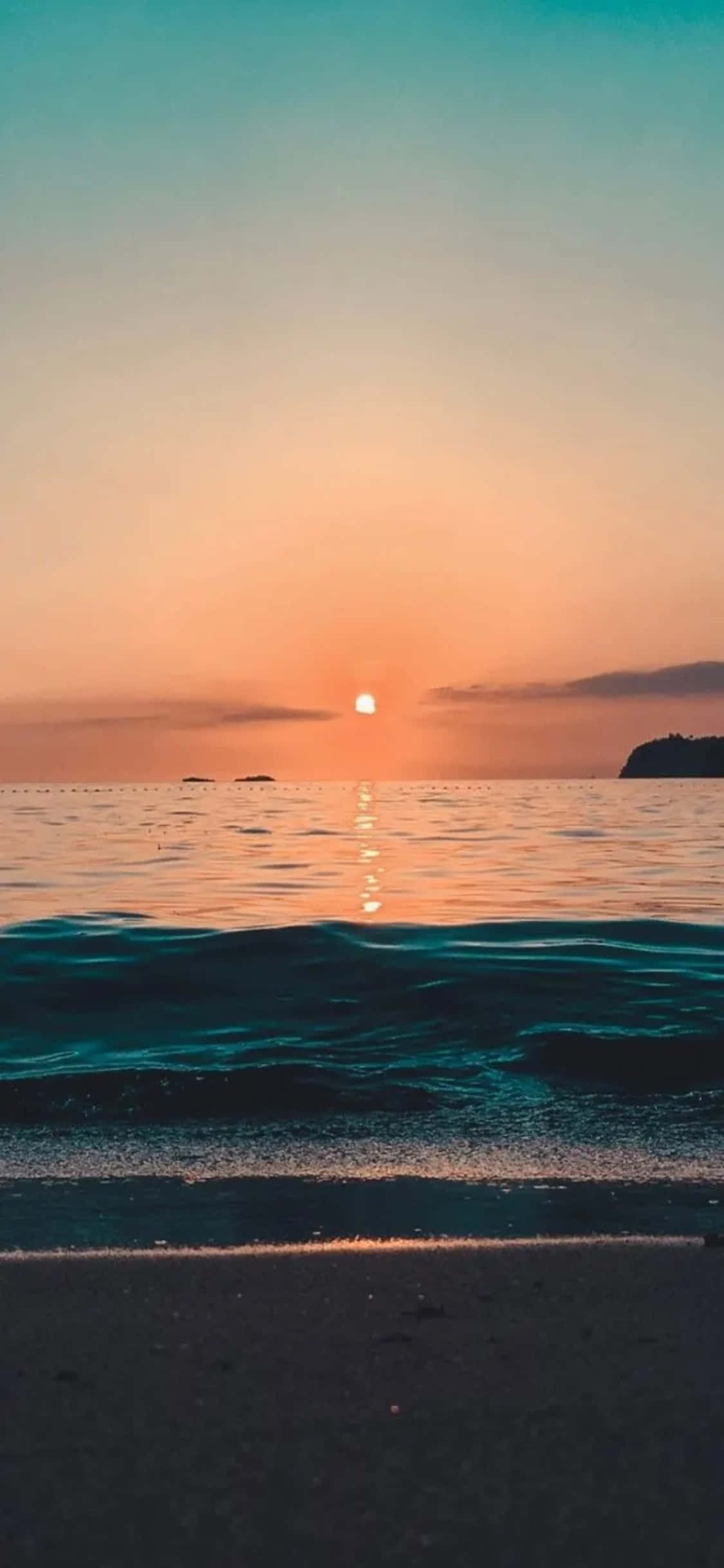 iPhone XS ビーチ夕日背景 壁紙