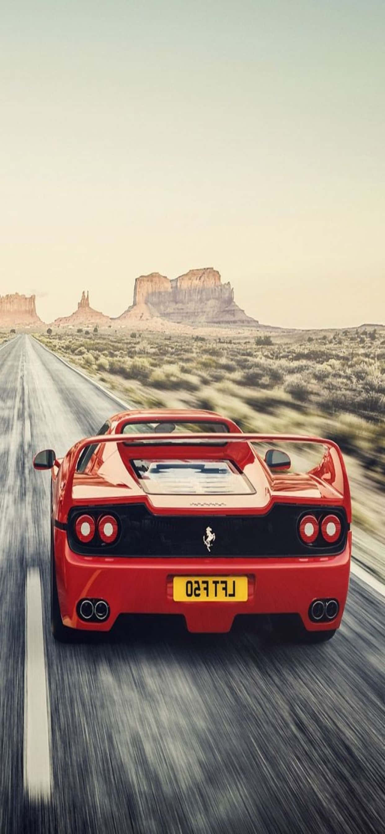 iPhone Xs Max フェラーリ 背景 レッド フェラーリ F50 オン・ザ・ロード 壁紙