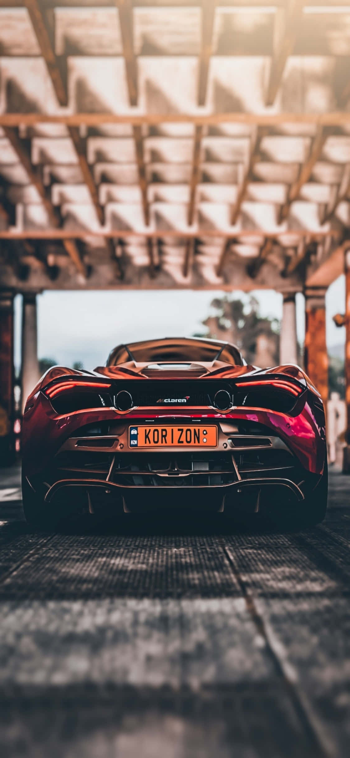 iPhone Xs McLaren 720sのハンドルを握ろう 壁紙