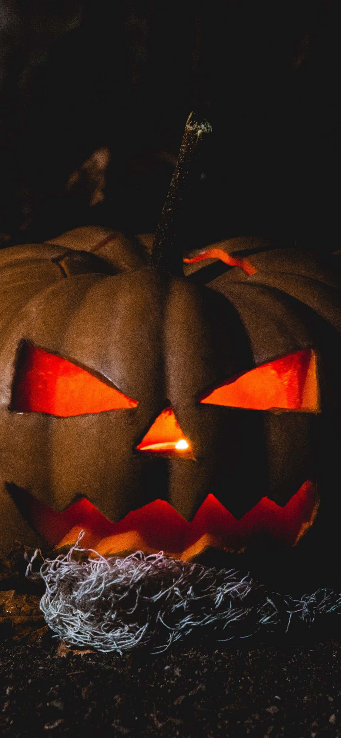 iPhone ハロウィン背景 不気味なジャック・オー・ランタン 壁紙