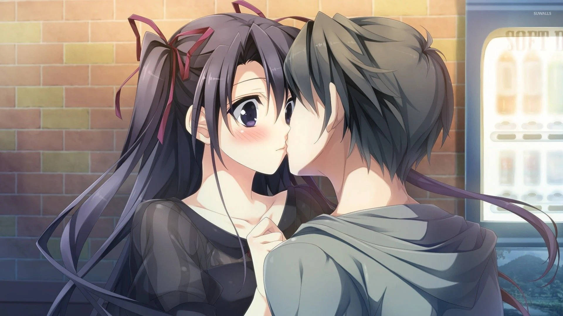 かわいいアニメカップルがレンガ壁の前でキス 壁紙