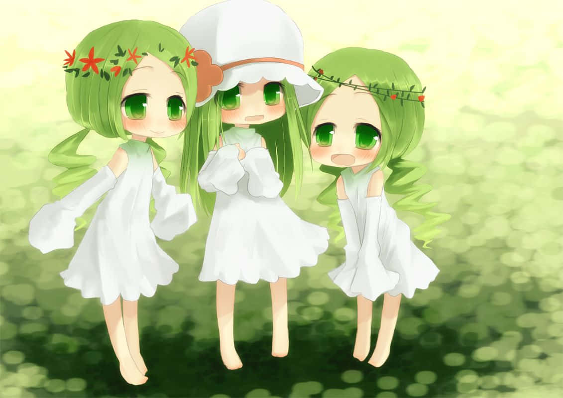 かわいい緑色の三人のキャラクター 壁紙