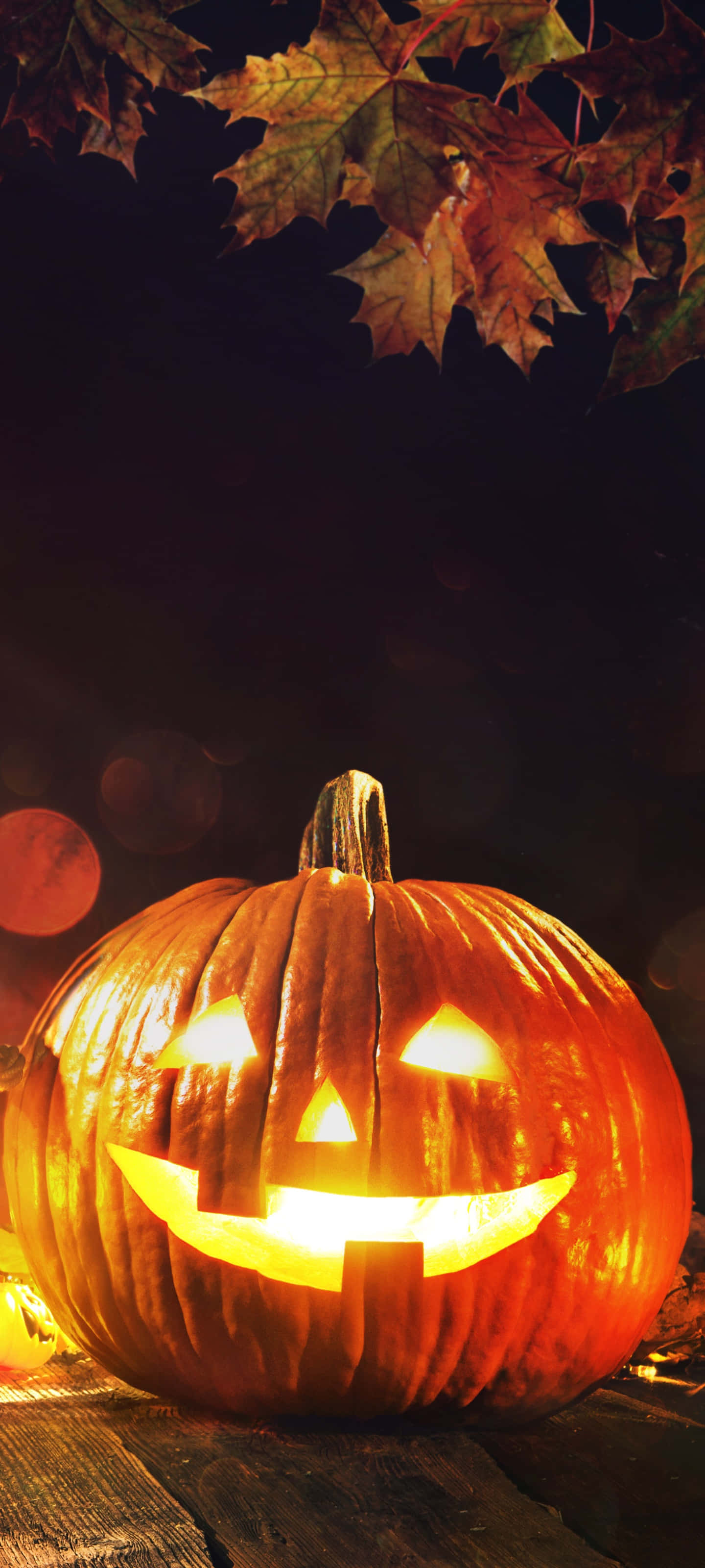 このハロウィンの電話背景で不気味な楽しみの準備をしよう！ 壁紙