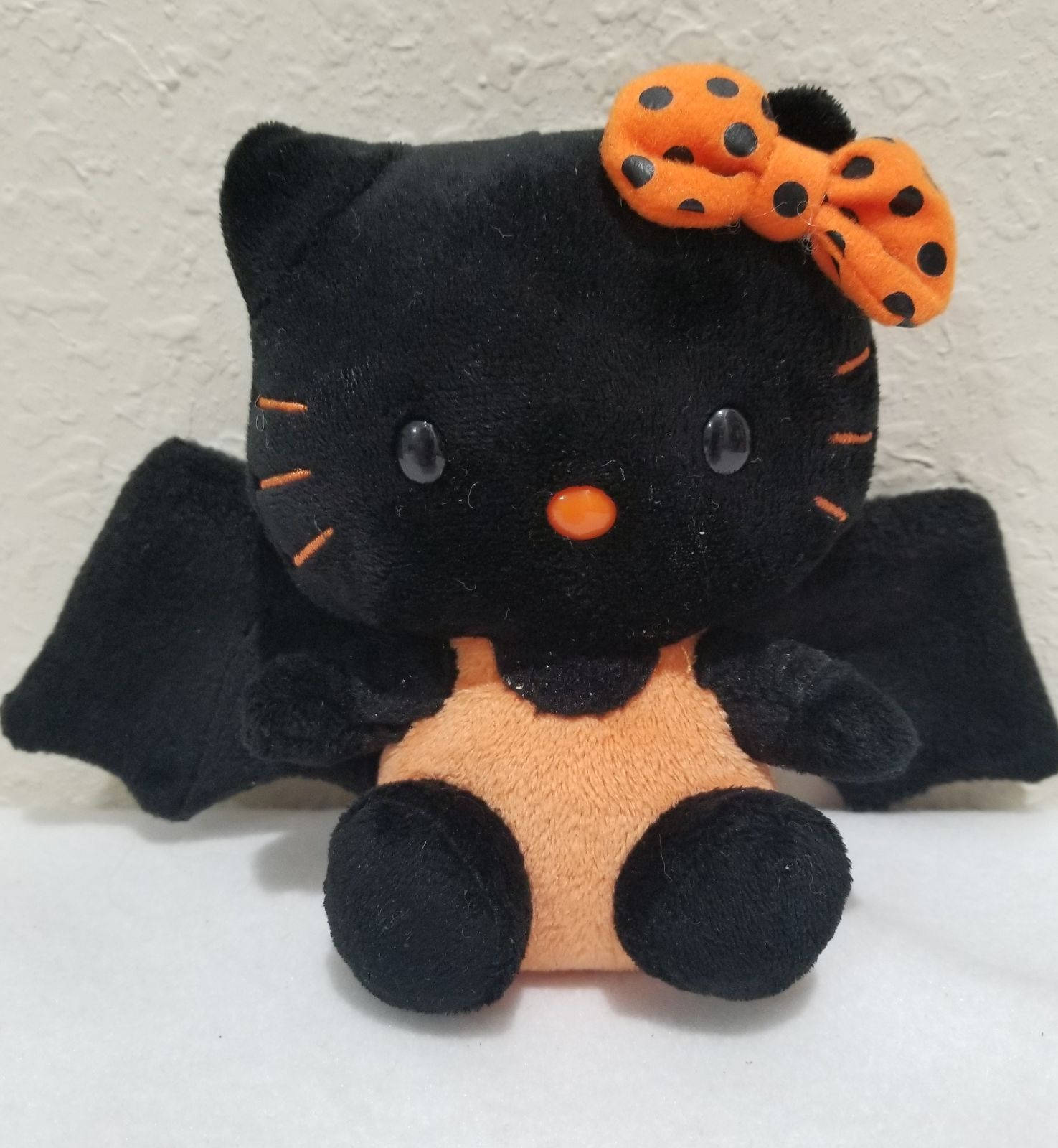 オレンジと黒のバット ハローキティ ハロウィン 壁紙
