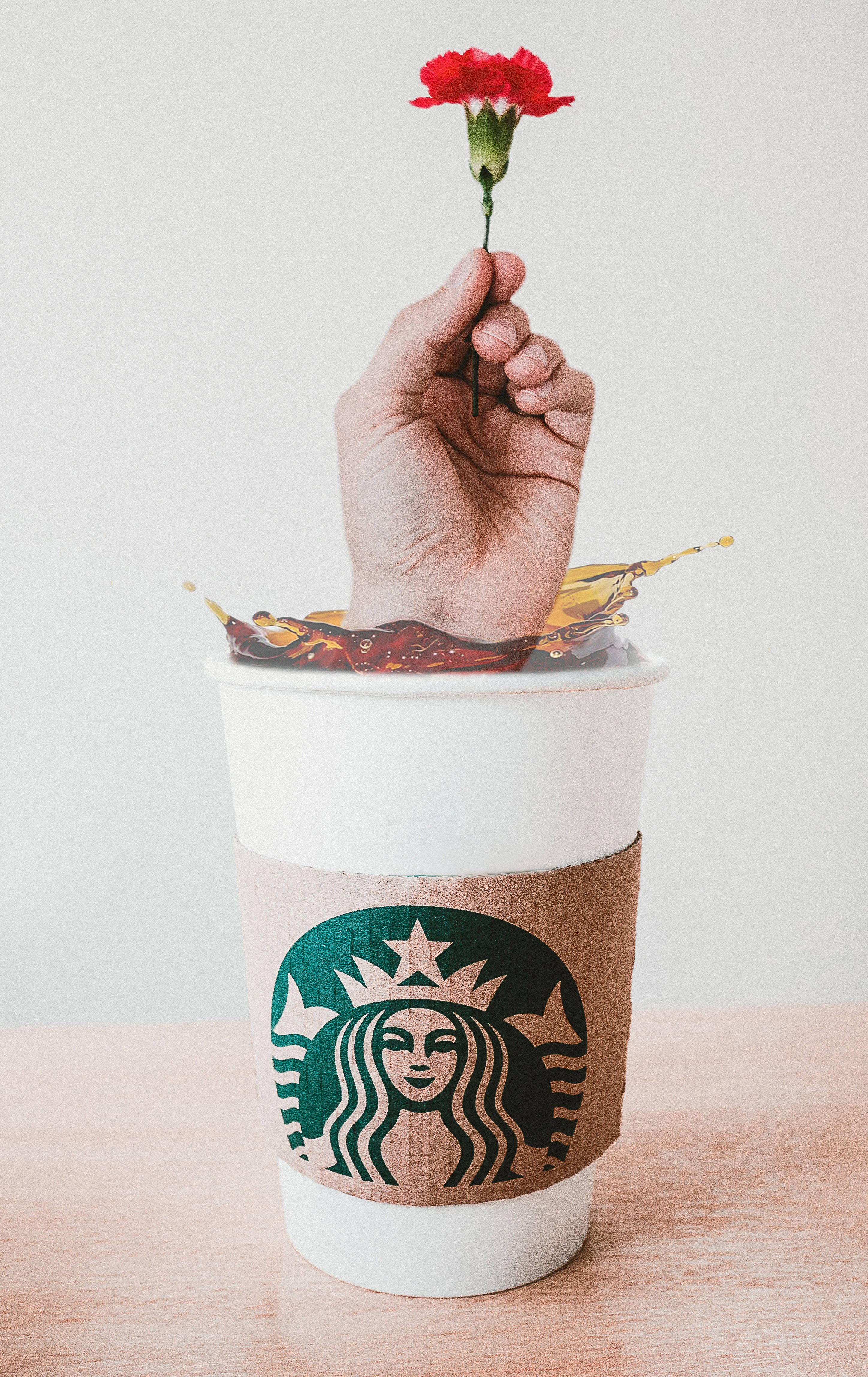 キャプション：iPhoneでスターバックスのコーヒー体験を豊かに 壁紙
