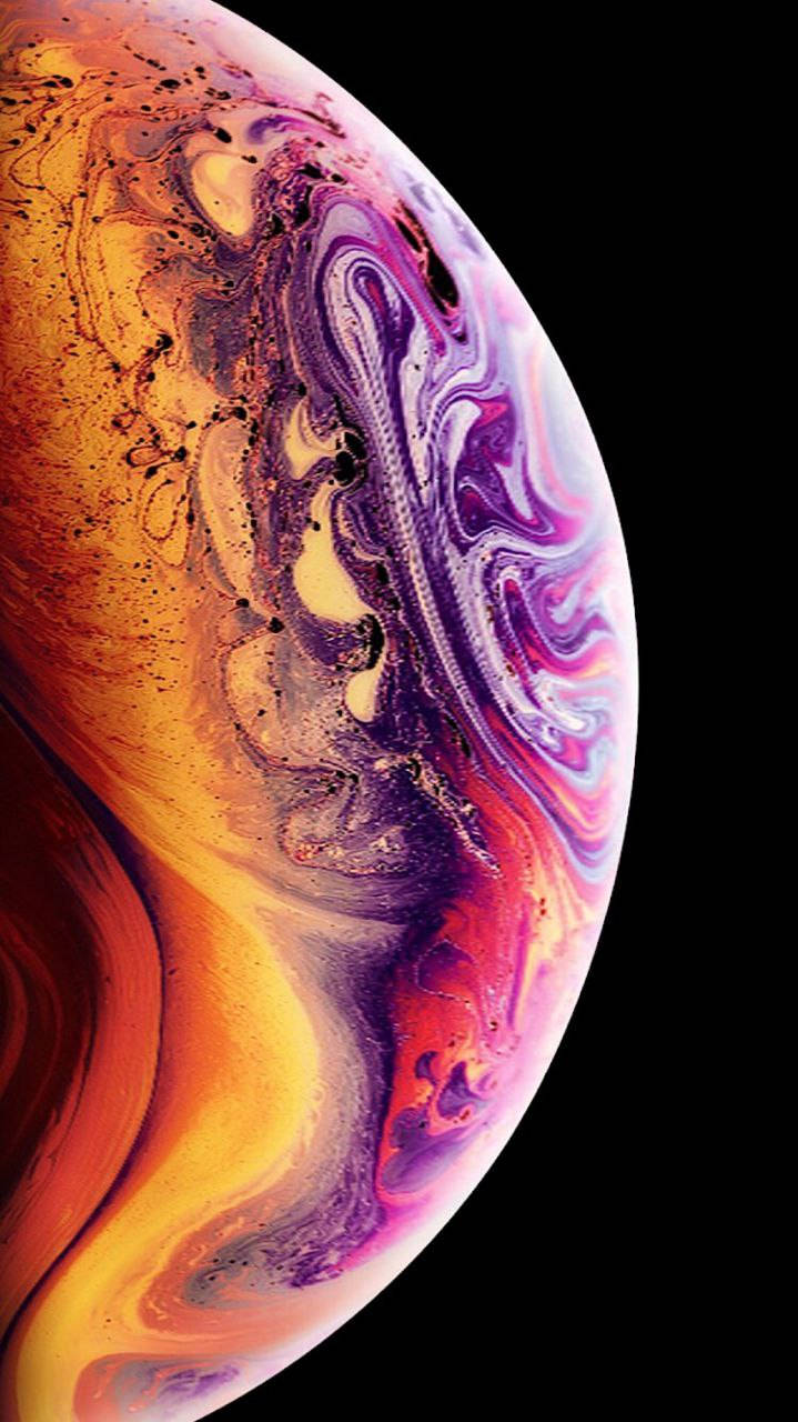 キャプション：見事な大理石の惑星球体の壁紙を表示したオリジナルiPhone 7 壁紙