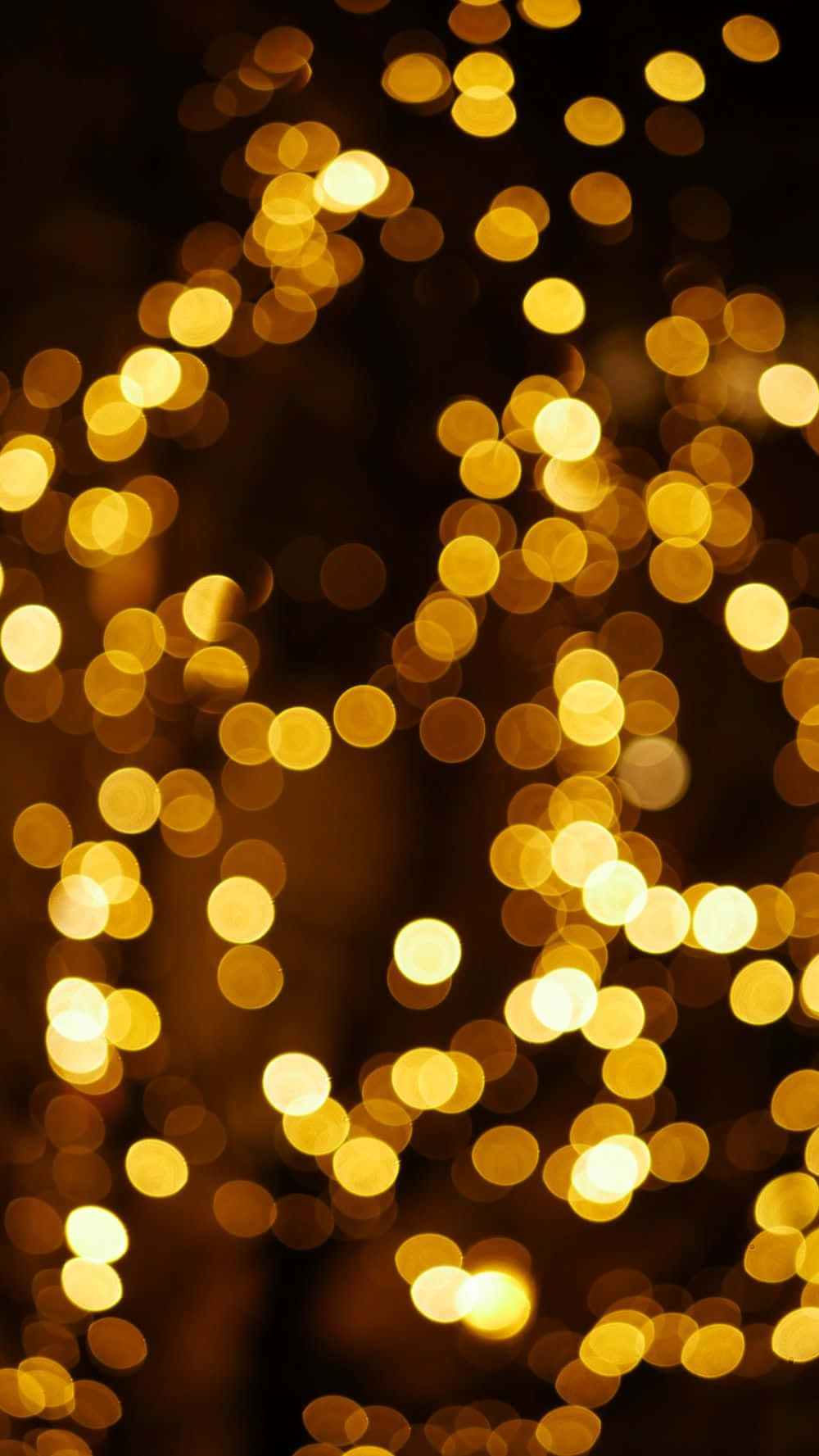 クリスマスライトのぼかしイエローな美しい写真 壁紙