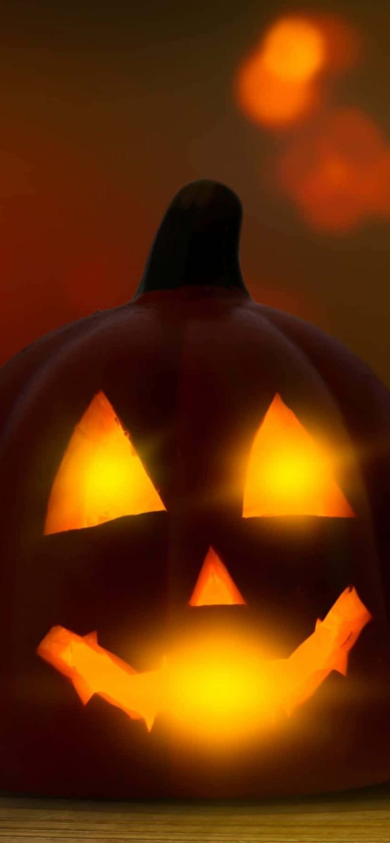 スタイリッシュなハロウィンiPhone壁紙で、スマホにちょっとした不気味な楽しさを 壁紙