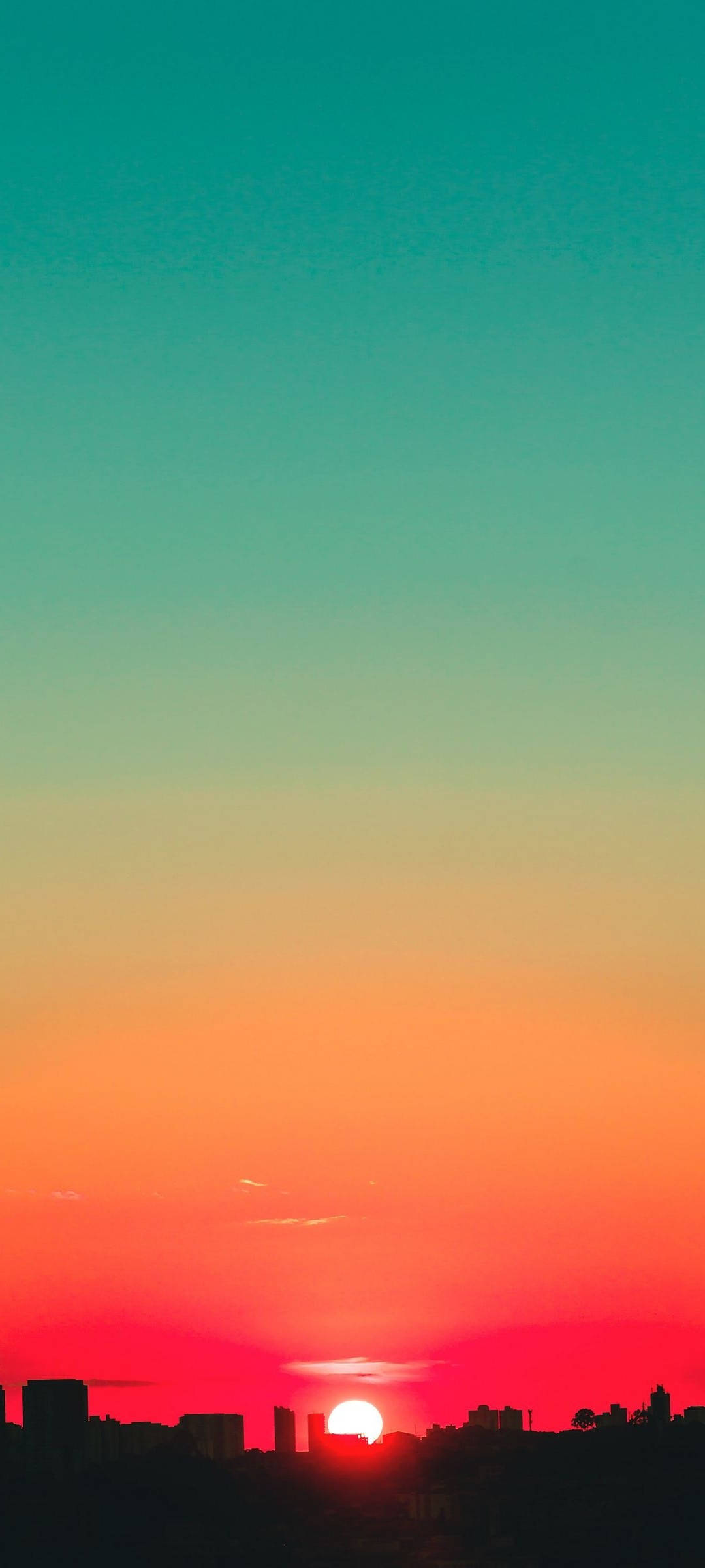 ティールとレッドの夕焼け空 壁紙
