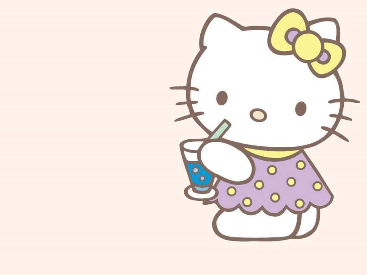 ハローキティがドリンクを飲むノートパソコン壁紙 壁紙