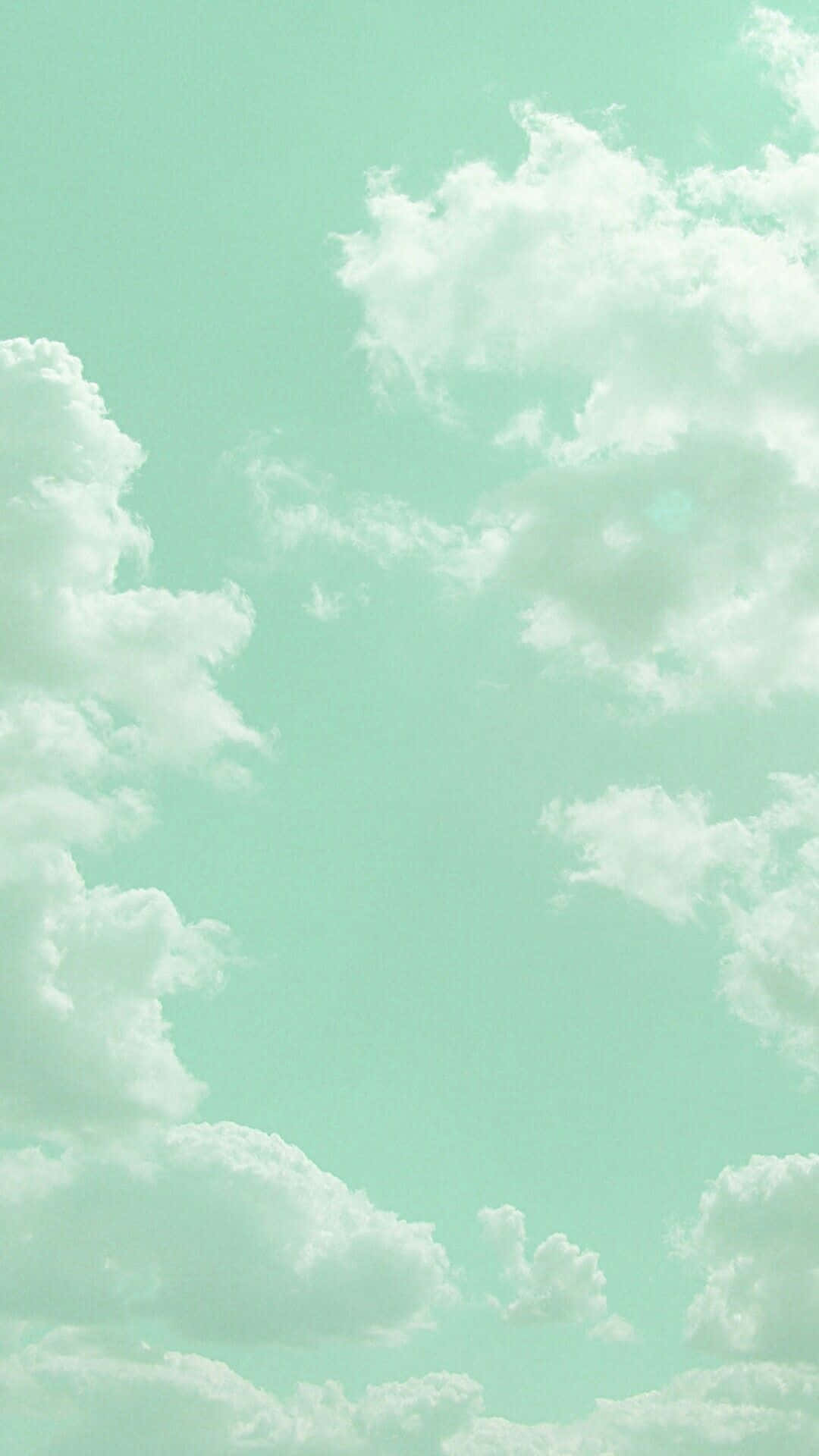パステルグリーンの背景と白い雲 壁紙