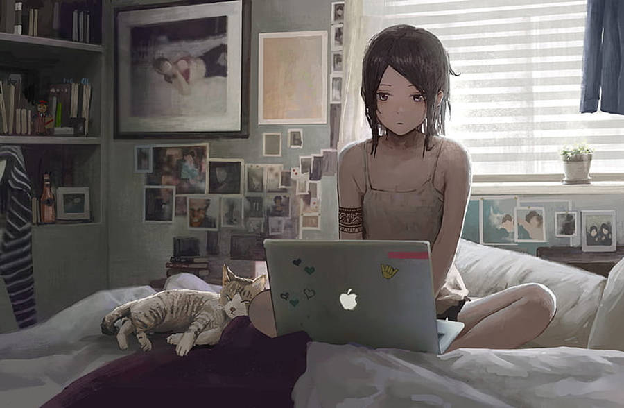 ベッドでノートパソコンを操作するアニメ少女 壁紙