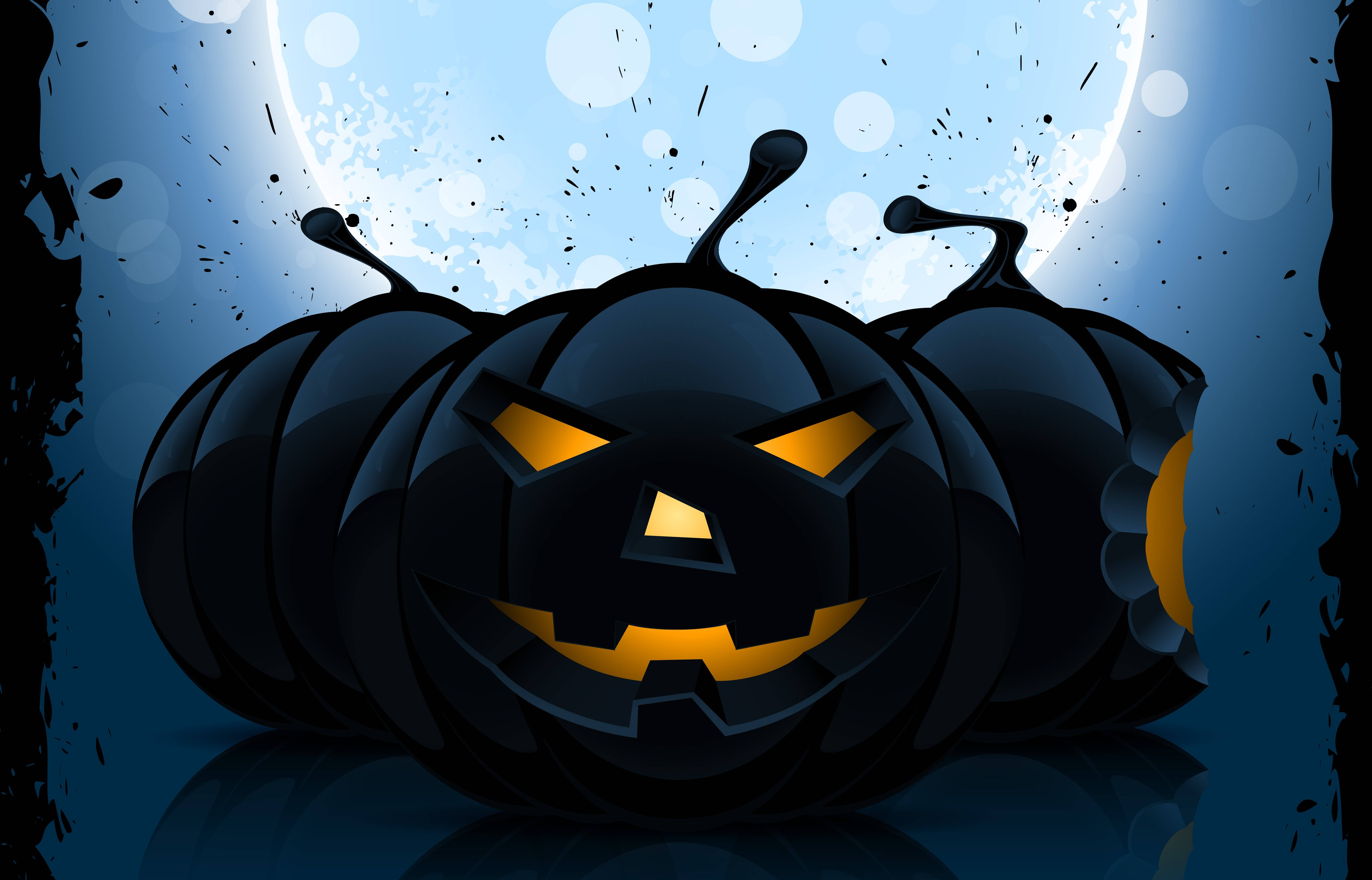不気味で輝く黒いカボチャでハロウィンを祝おう 壁紙
