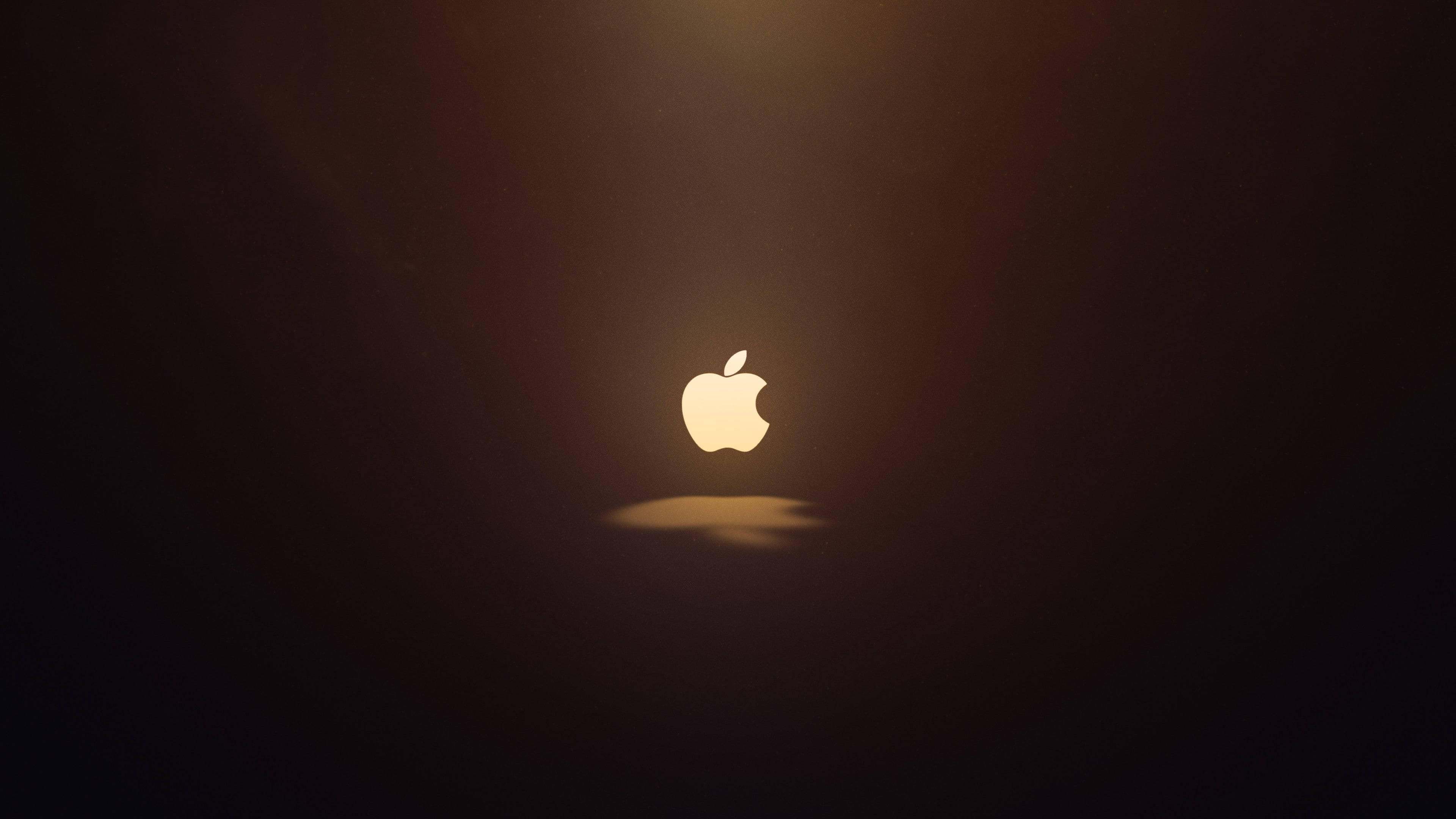 光るAppleロゴ Macbook Air 壁紙