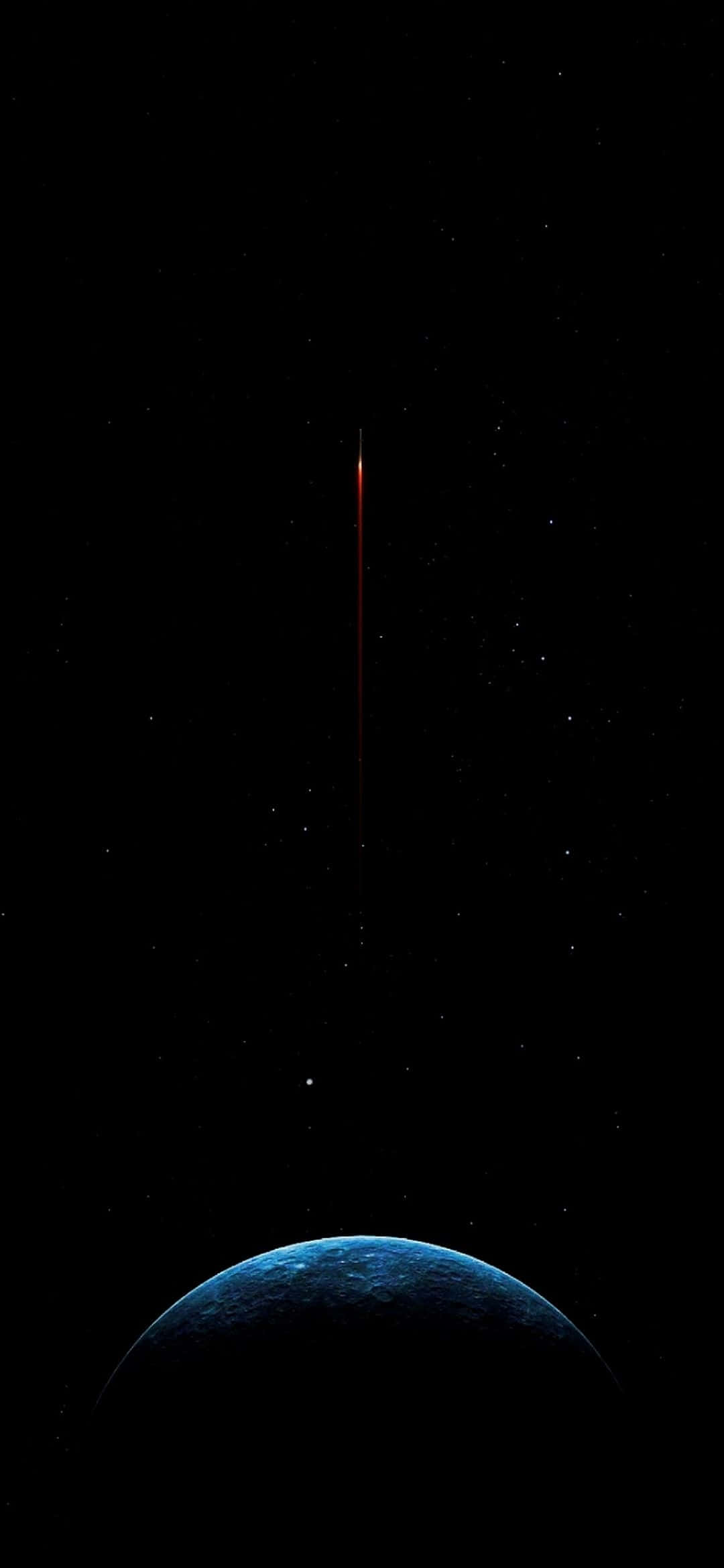 地球の上空を飛ぶロケット 壁紙