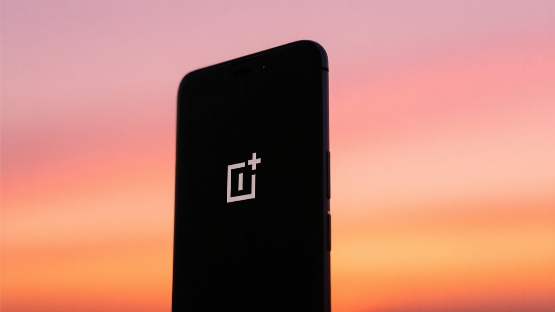 夕日とスマホのシルエット 壁紙