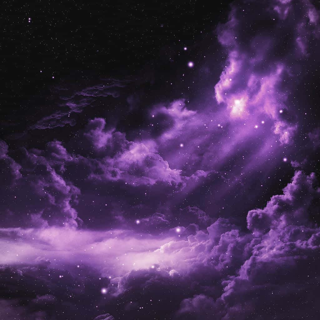 夜空に浮かぶ紫色の雲と星々 壁紙