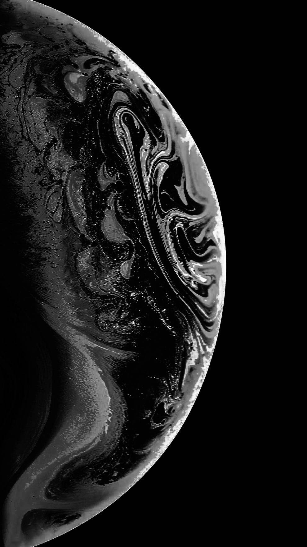 宇宙の漆黒の惑星 壁紙