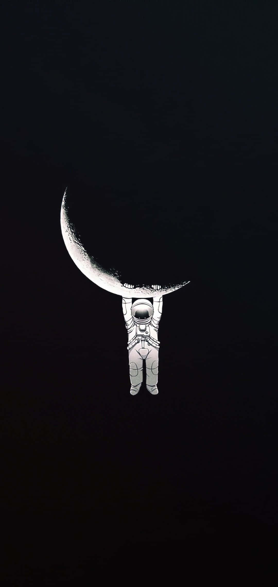 手に月を抱く宇宙飛行士 壁紙