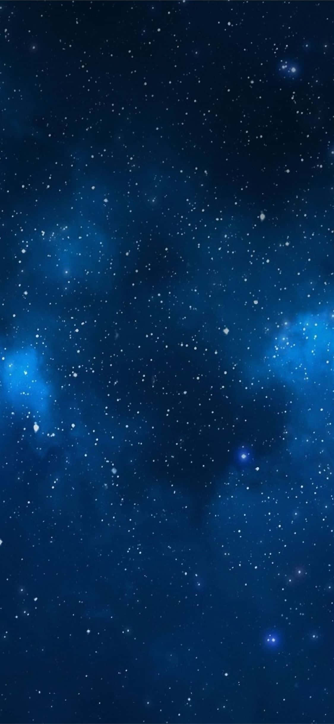 星と星が広がる青い宇宙の背景 壁紙