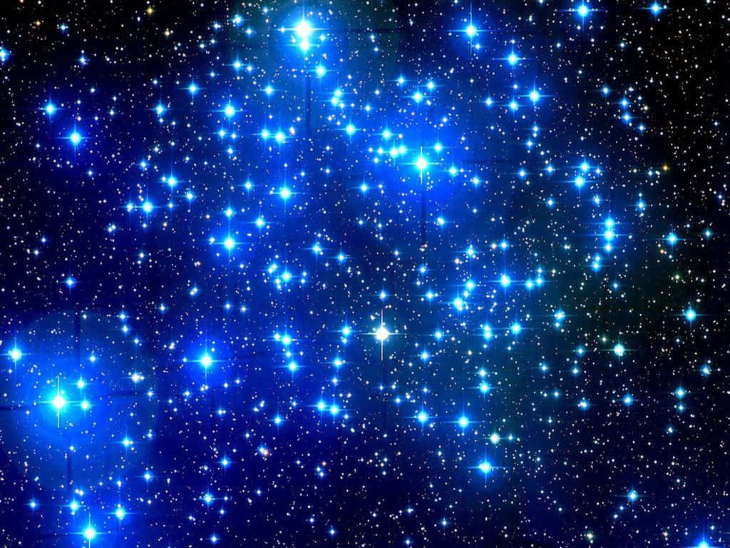 暗い宇宙で輝く青い星々 壁紙