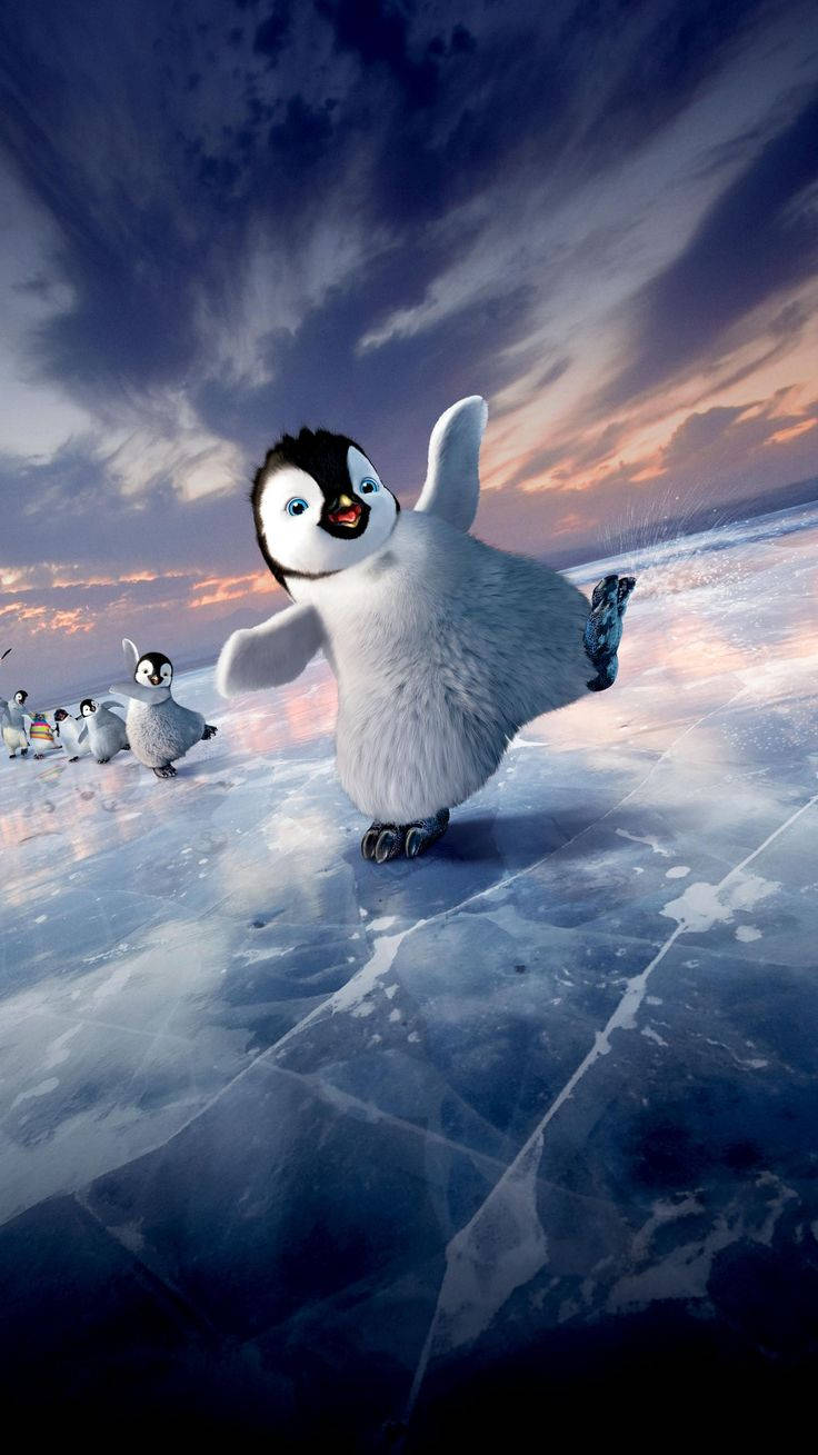氷の上を滑るペンギンたち 壁紙