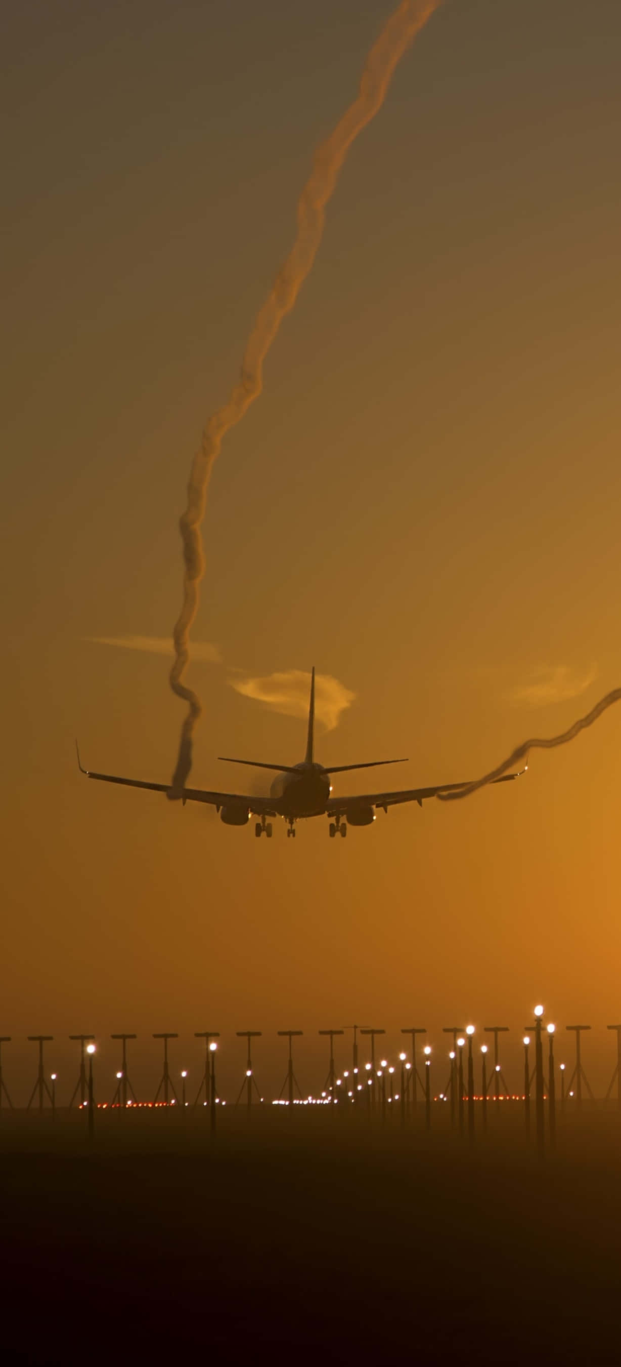 着陸間近の飛行機 Android プレーン背景 壁紙