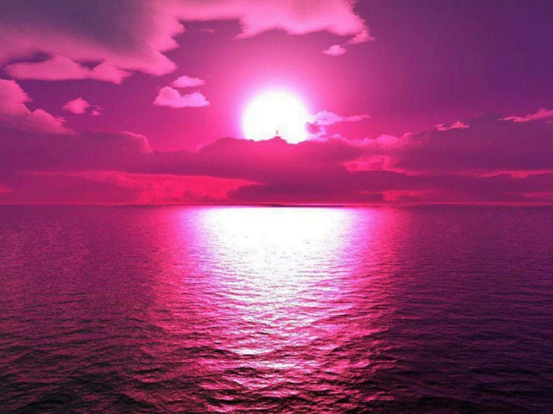 美しいダークピンクの海の夕日 壁紙
