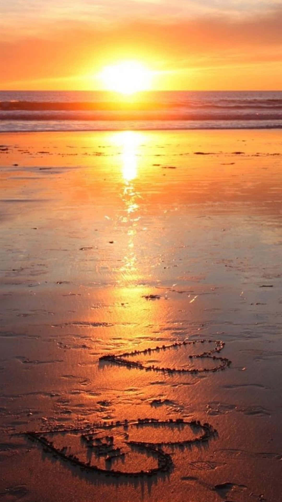 美しいビーチの夕日を楽しむ 壁紙
