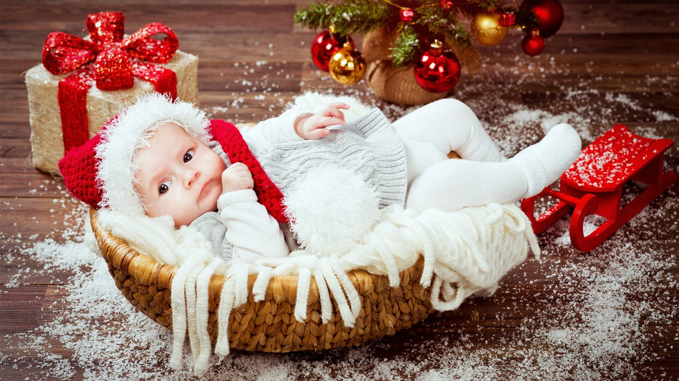 赤ちゃんとクリスマスプレゼント 壁紙