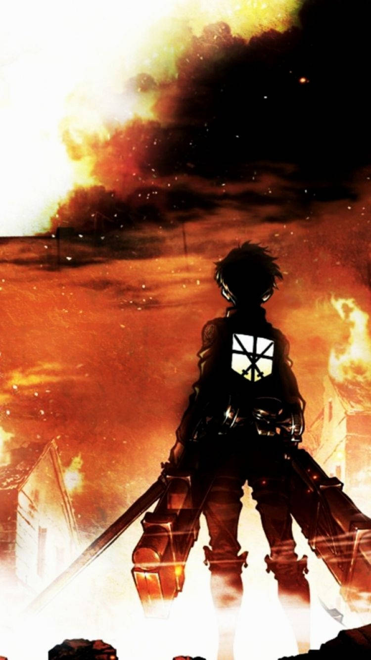 煙と炎の中でのエレン・イェーガーの後ろ姿『進撃の巨人』壁紙。