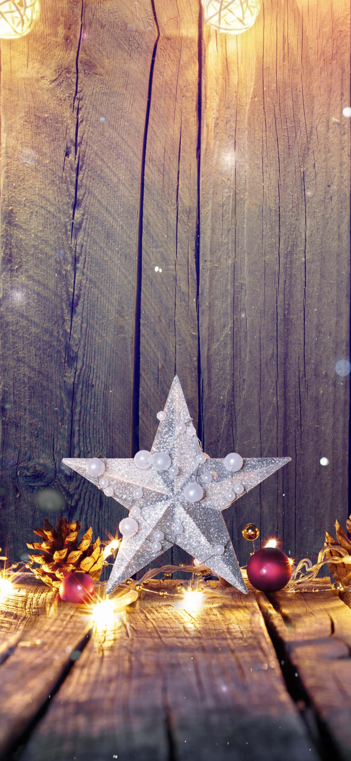 道を照らす輝くクリスマススター 壁紙