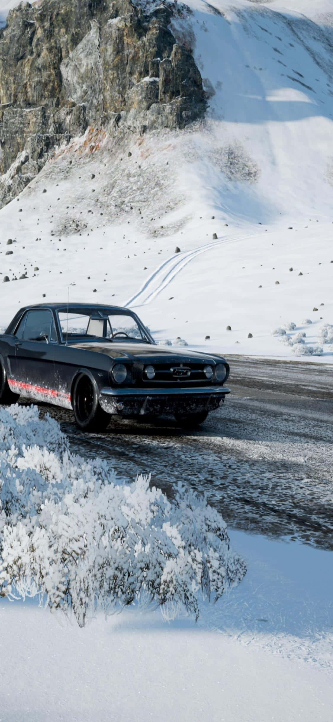 雪道を走る黒い車 壁紙