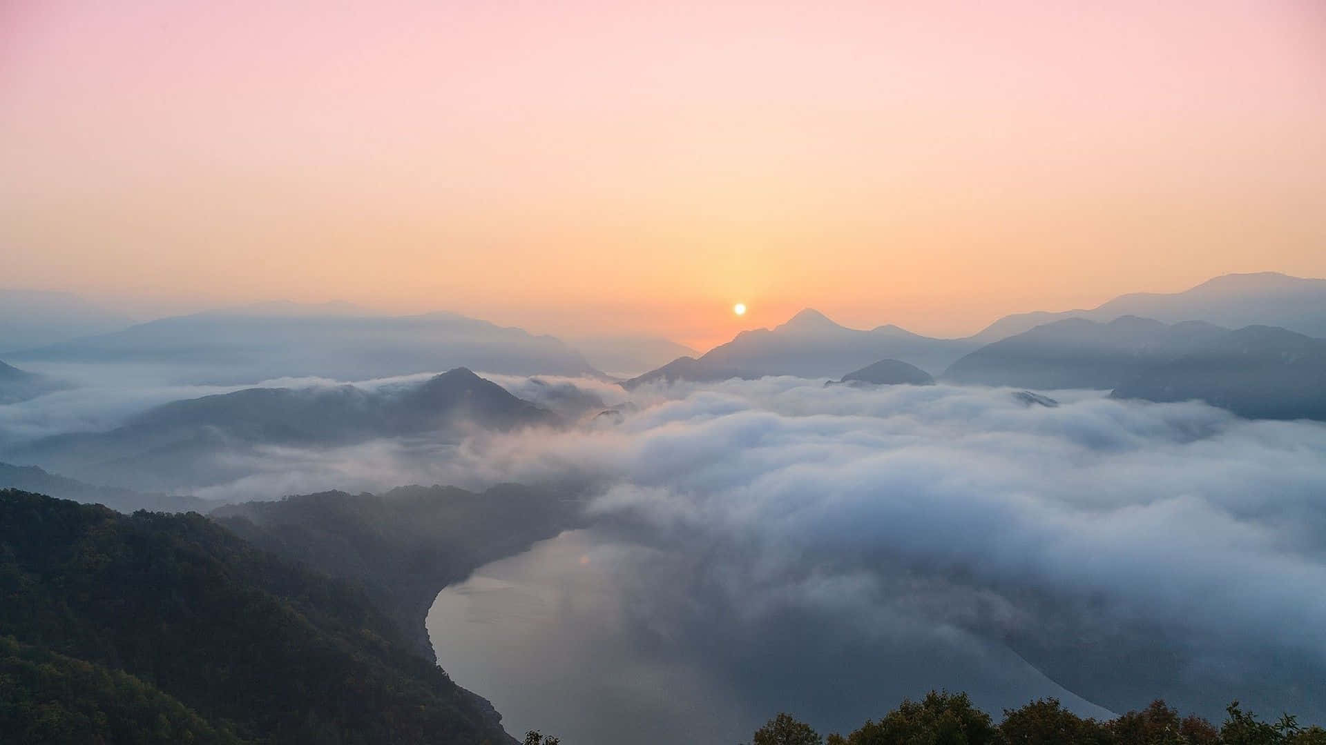 雲と昇る朝日の風景背景 壁紙