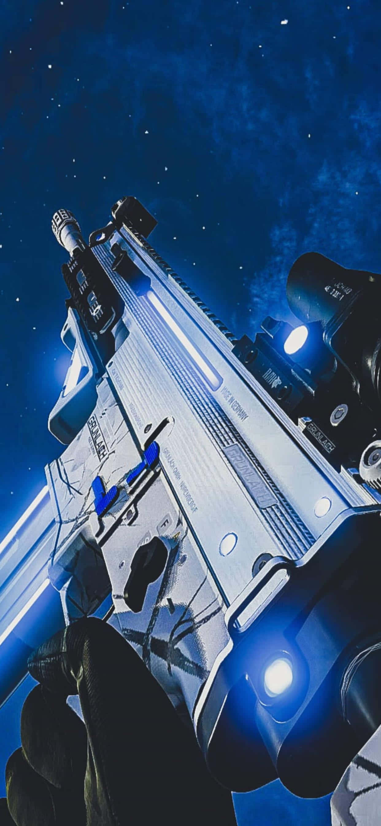 青い光を放つ空の銃 壁紙