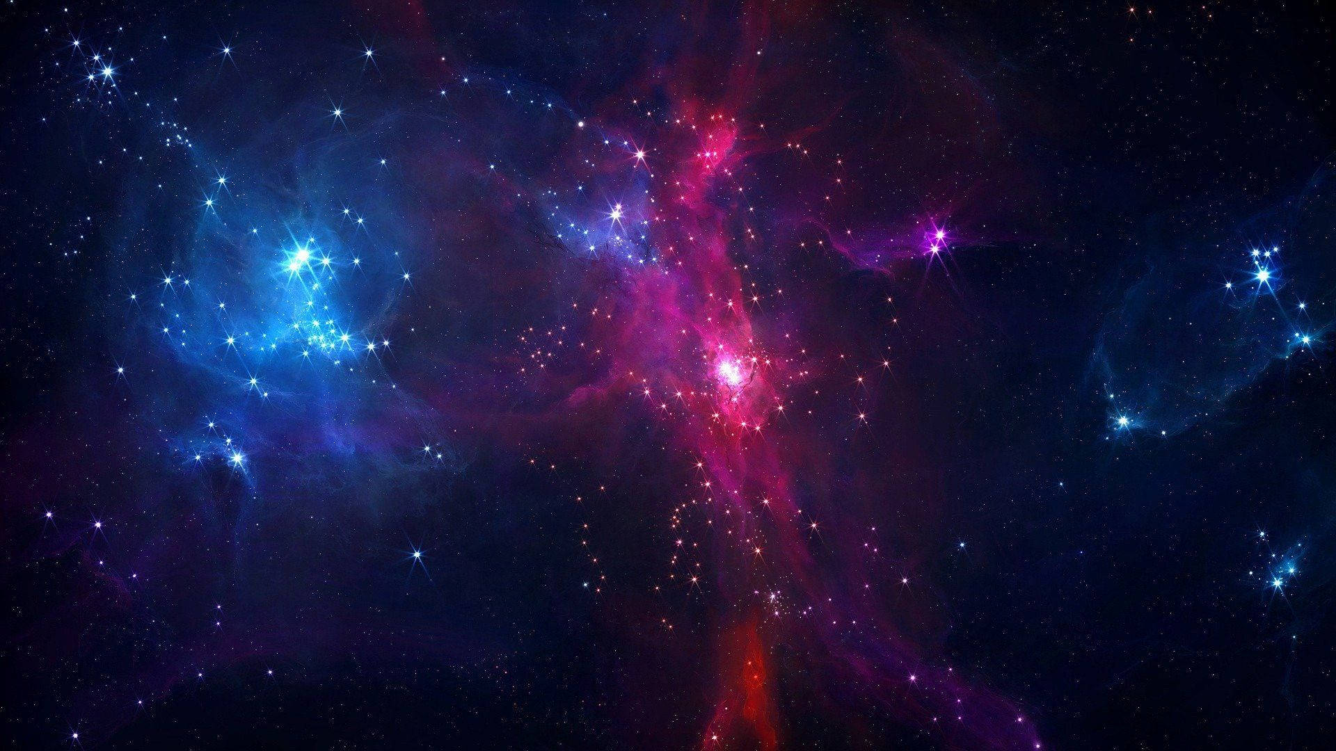青と紫の星と星雲が広がる宇宙 壁紙