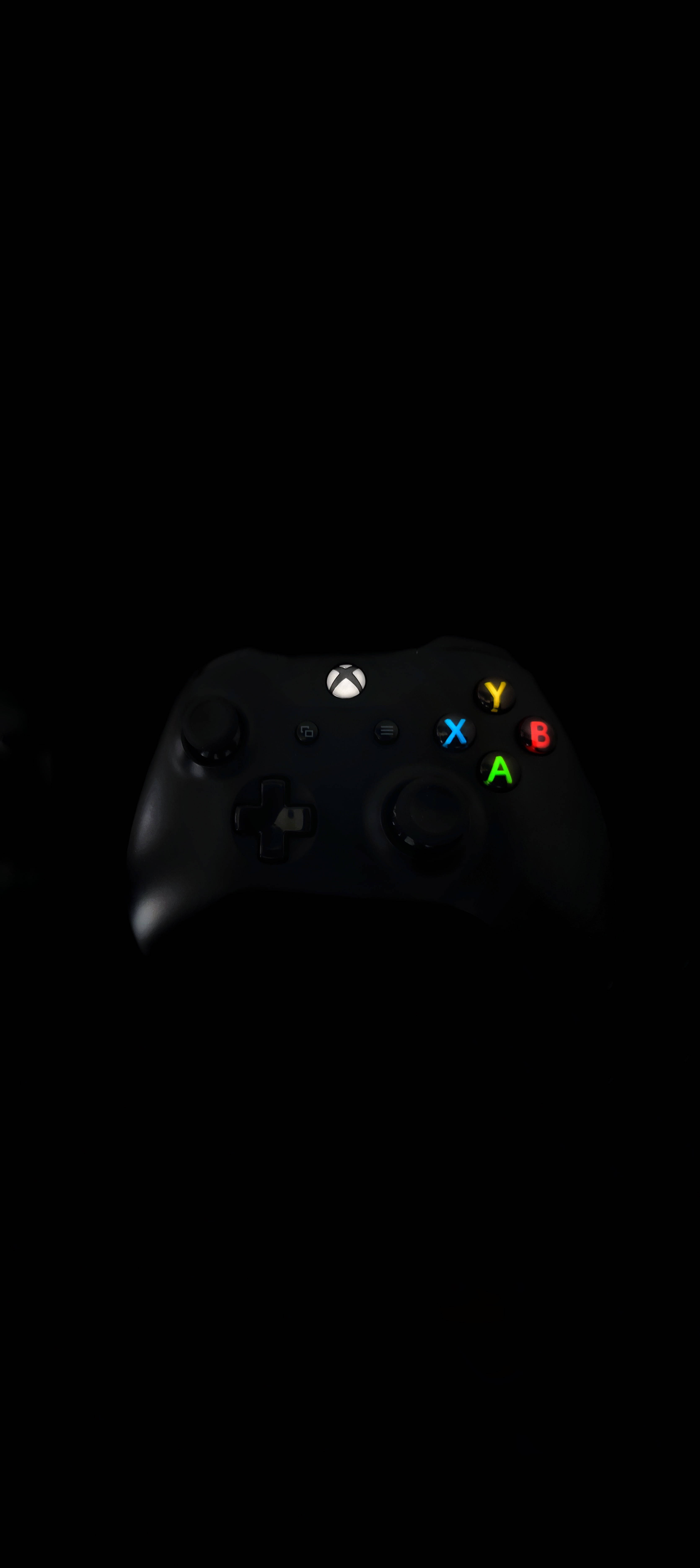 黒いXboxコントローラーの8Kスマホ壁紙 壁紙