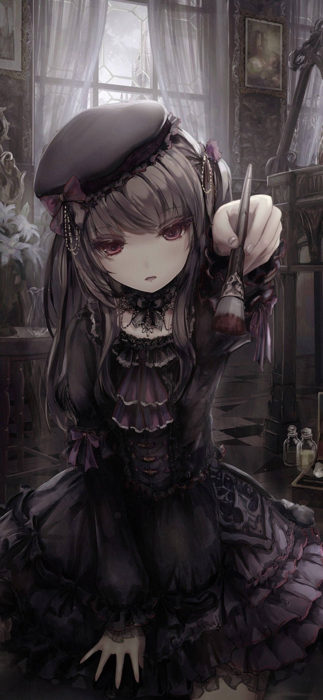 黒いドレスを着た少女が床に座っている 壁紙