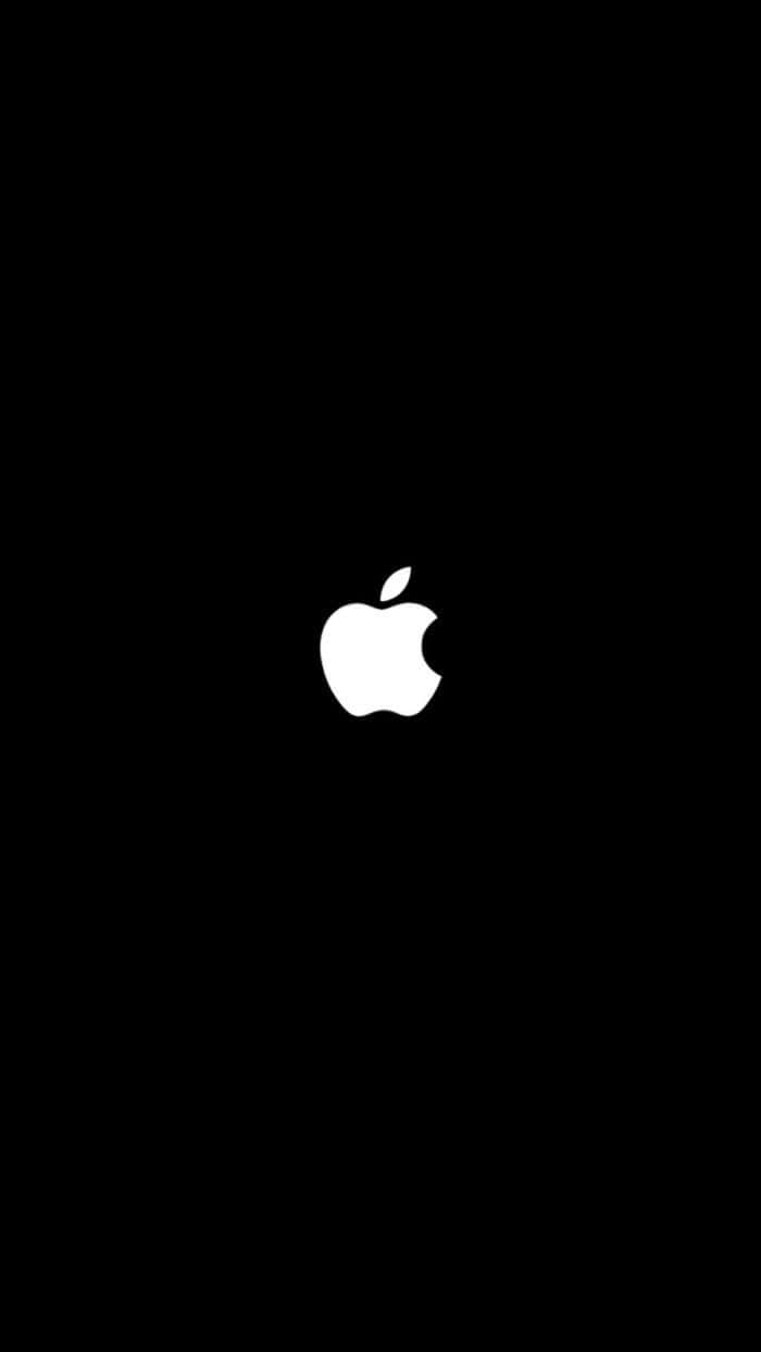 黒い背景にアップルのロゴが表示されている 壁紙