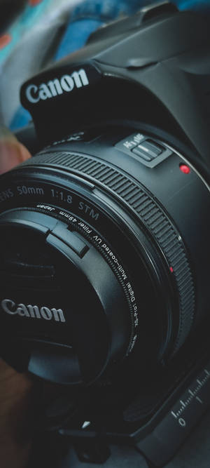 Canon DSLRカメラの輪郭 — Pixel 9 壁紙