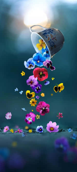 カップから溢れ出る魔法の花々の滝 — Samsung galaxy s22 壁紙