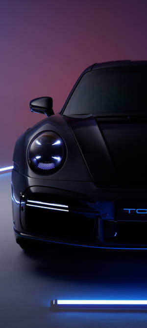 スタイリッシュなブラックのポルシェ911 — Pixel 10 壁紙