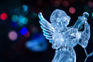 ガラス製クリスマスエンジェルフィギュアの壁紙